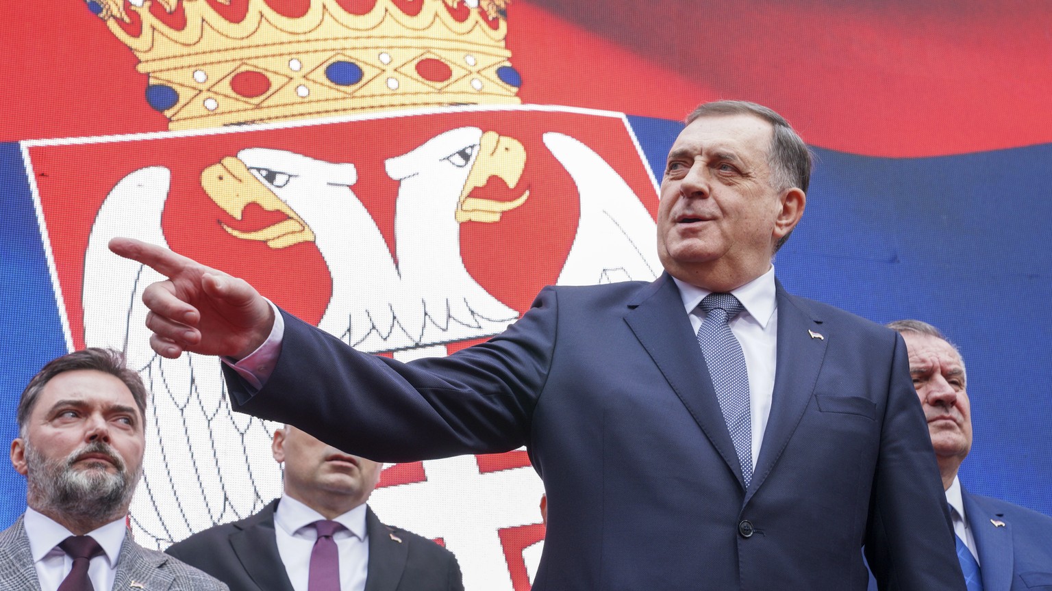 Bosnian Serb President Milorad Dodik speaks after a court sentenced him to one year in prison and banned him from engaging in politics for six years over his separatist actions, during a rally in the  ...