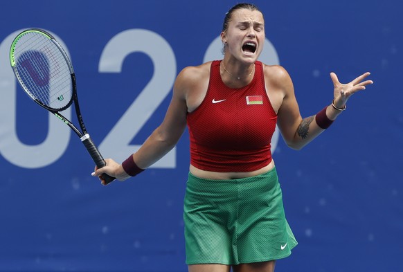 epa09366251 Aryna Sabalenka of Belarus reacts after a point against Donna Vekic of Croatia during the Women&#039;s Singles Second Round Tennis events of the Tokyo 2020 Olympic Games at the Ariake Coli ...