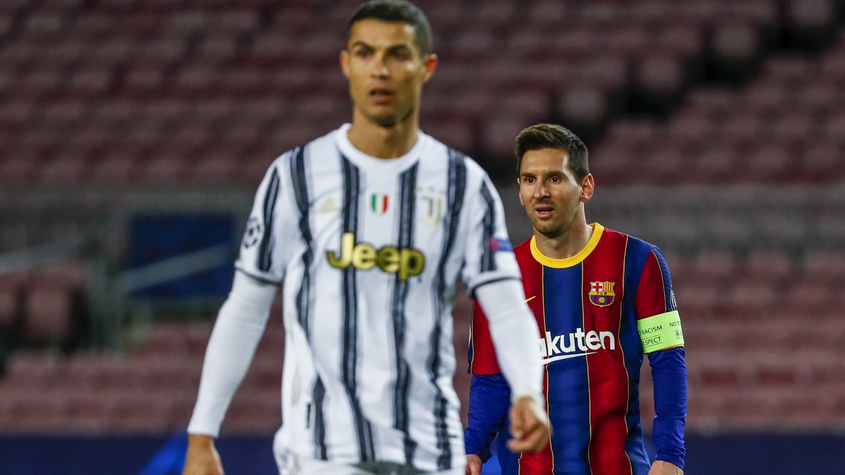 Barcelona's Lionel Messi, right, and Juventus' Cristiano Ronaldo during the Champions League group G soccer match between FC Barcelona and Juventus at the Camp Nou stadium in Barcelona, Spai ...