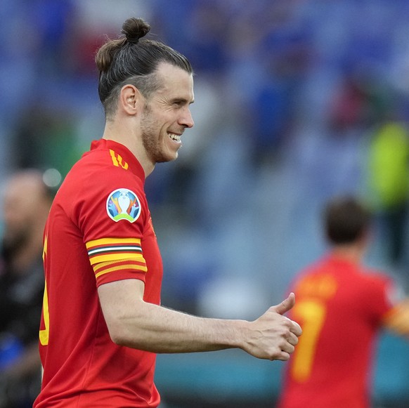Wales' Gareth Bale gives the thumb-up sign at the end of the Euro 2020 soccer championship group A match between Italy and Wales, at the Rome Olympic stadium, Sunday, June 20, 2021. Italy won 1-0 ...
