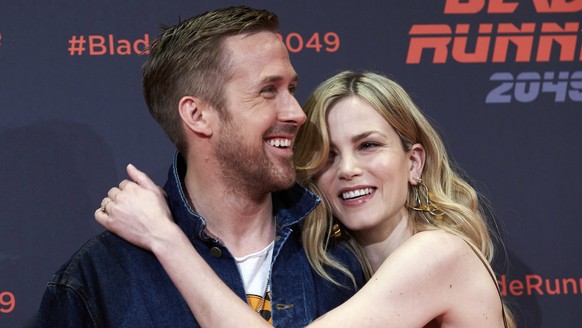 epa06037435 Canadian actor/cast member Ryan Gosling (L) and Dutch actress/cast member Sylvia Hoeks (R) pose for the media during the presentation of &#039;Blade Runner 2049&#039; in Barcelona, Spain,  ...