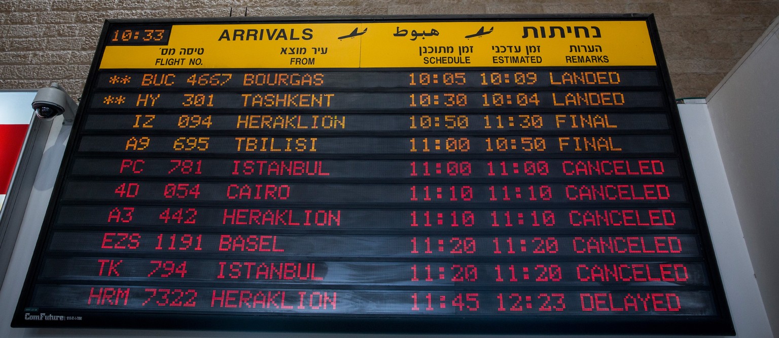 TEL AVIV, ISRAEL - JULY 24: The arrivals gate board shows cancelled flights at terminal three at Ben Gurion Airport on July 24, 2014 in Tel Aviv, Israel. The Federal Aviation Administration recently h ...