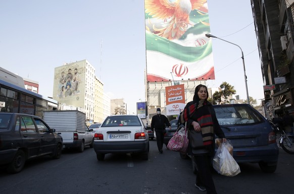 epa10493676 Iranians walk in downtown Tehran, Iran, 27 February 2023. According to Isna news agency, Iranian foreign minister Amir-Abdoulahian on 26 February 2023 said that Iran is close to reach a nu ...