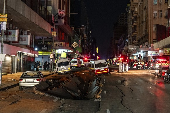 Emergency services gather at the scene of a gas explosion downtown Johannesburg, South Africa, Wednesday July 19, 2023. Search and rescue officials also ordered residents in nearby buildings to evacua ...