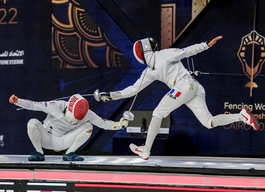 220720 -- CAIRO, July 20, 2022 -- Romain Cannone R of France competes against Minobe Kazuyasu of Japan during the men s epee individual final at the 2022 Fencing World Championships in Cairo, Egypt, o ...