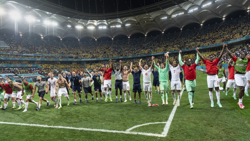 epa09309708 Players of Switzerland celebrate after winning the UEFA EURO 2020 round of 16 soccer match between France and Switzerland in Bucharest, Romania, 28 June 2021. EPA/JEAN-CHRISTOPHE BOTT (RES ...