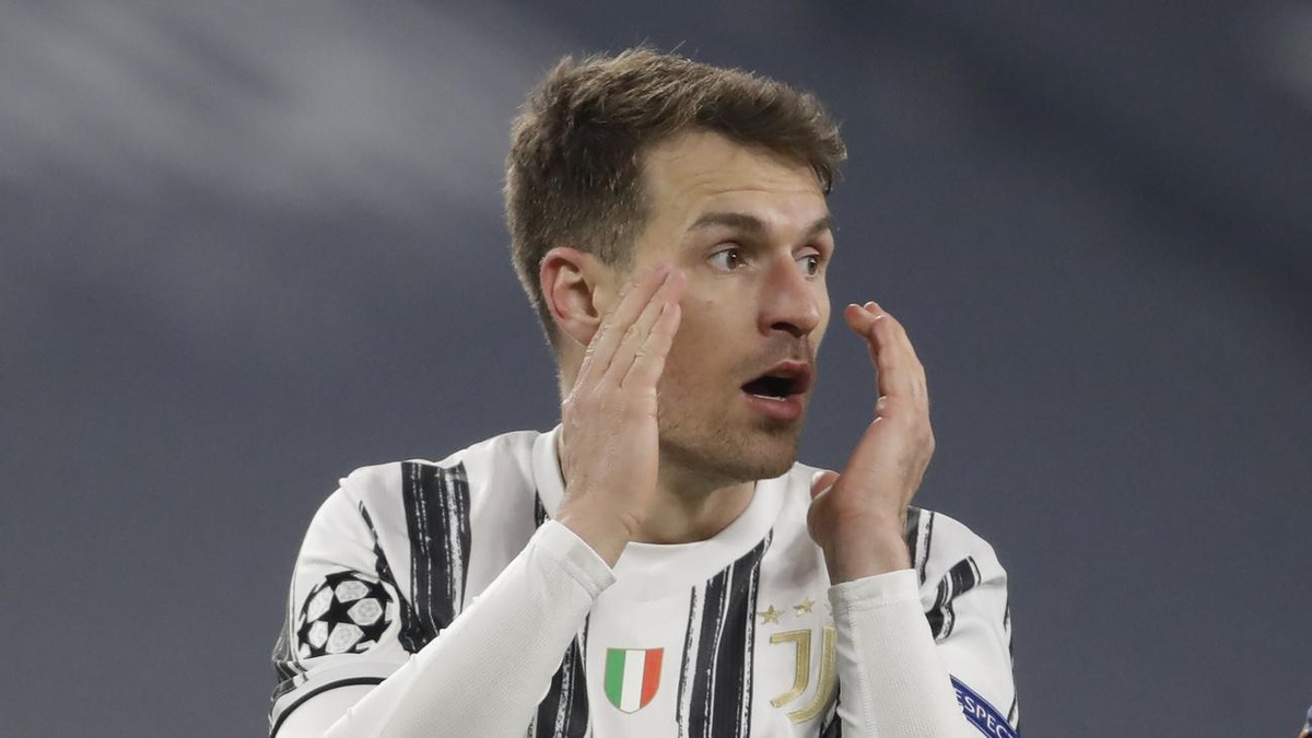 Juventus' Aaron Ramsey gestures during the Champions League, round of 8, second-leg soccer match between Juventus and Porto at the Allianz stadium in Turin, Italy, Tuesday , March 9, 2021. (AP Ph ...