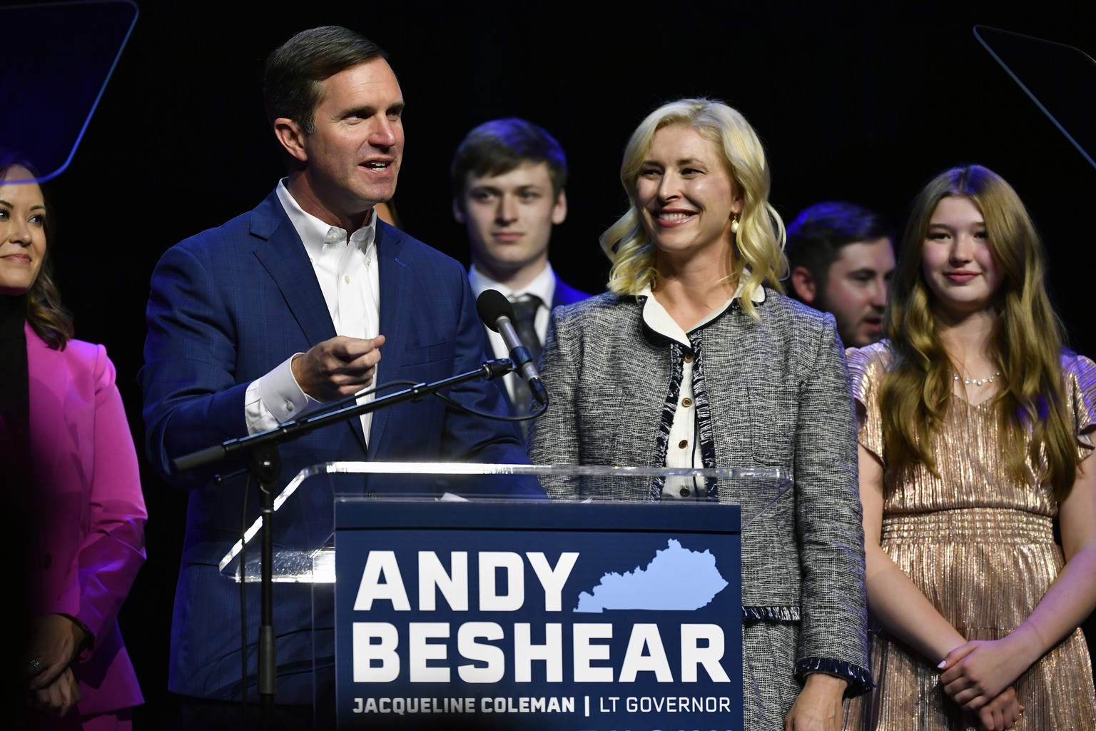 Kentucky Gov. Andy Beshear speaks during an election night rally after he was elected to a second term in Louisville, Ky., Tuesday, Nov. 7, 2023. At right is his wife Britiany Beshear. (AP Photo/Timot ...