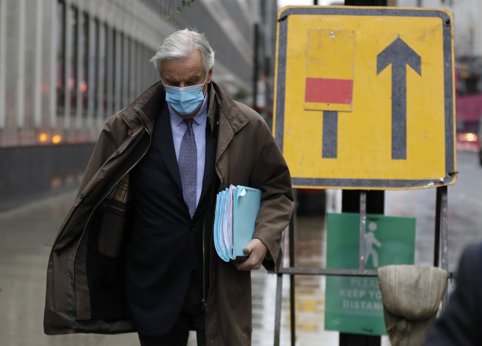 European Union chief Brexit negotiator Michel Barnier walks to the Conference Centre in London, Thursday, Dec. 3, 2020. With less than one month to go before the U.K. exits the EU's economic orbit, ta ...