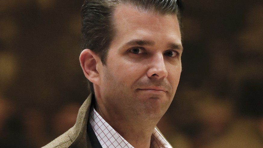 FILE - In this Nov. 16, 2016 file photo, Donald Trump Jr., walks from the elevator at Trump Tower in New York. President Donald Trump’s eldest son on Monday appeared to mock the sexual assault allegat ...