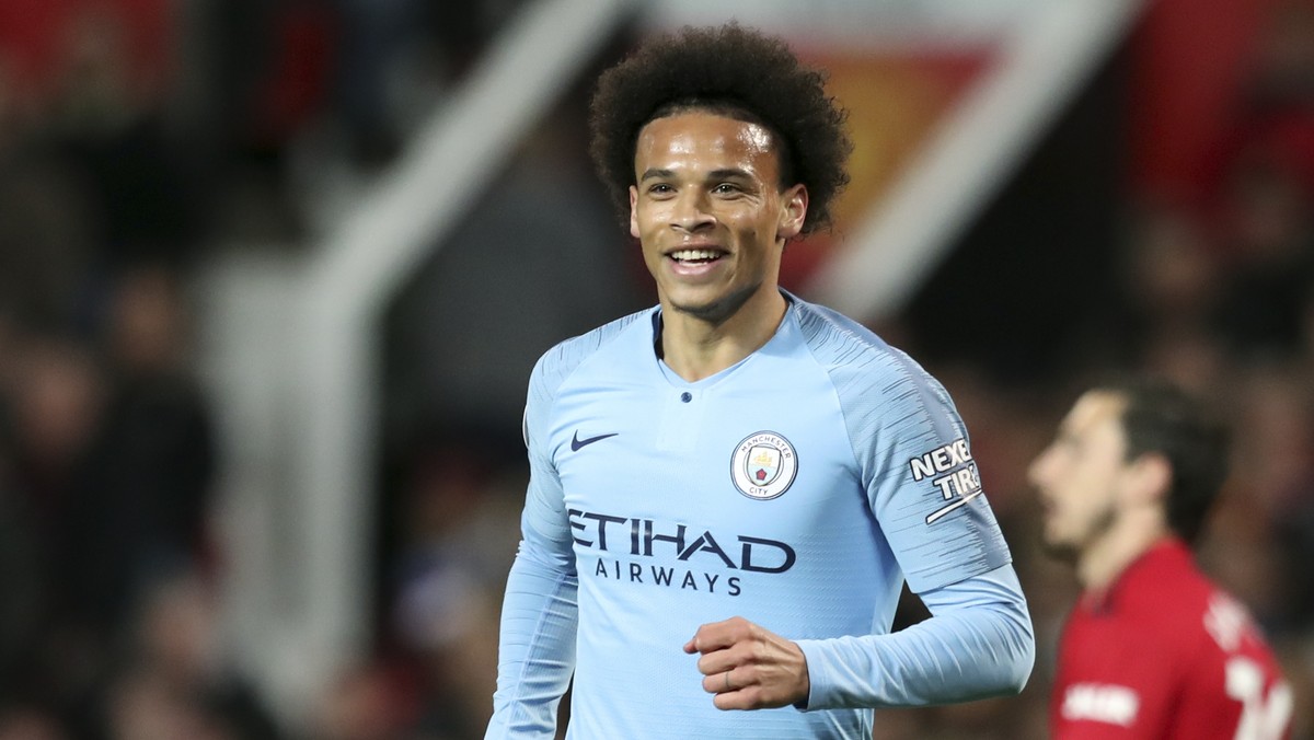 Manchester City's Leroy Sane celebrates after scoring his side's second goal during the English Premier League soccer match between Manchester United and Manchester City at Old Trafford Stad ...