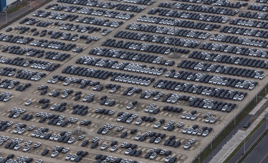 epa06756042 Cars seen on parking lot of the GAC Fiat Chrysler Automobiles Co. factory in Changsha, Hunan Province, China, 22 May 2018. Tha factory is is a joint venture between Chinese Guangzhou Autom ...