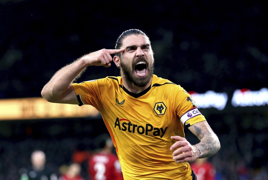 Wolverhampton Wanderers&#039; Ruben Neves celebrates scoring his side&#039;s third goal of the game, during the English Premier League soccer match between Wolverhampton Wanderers and Liverpool, at Mo ...