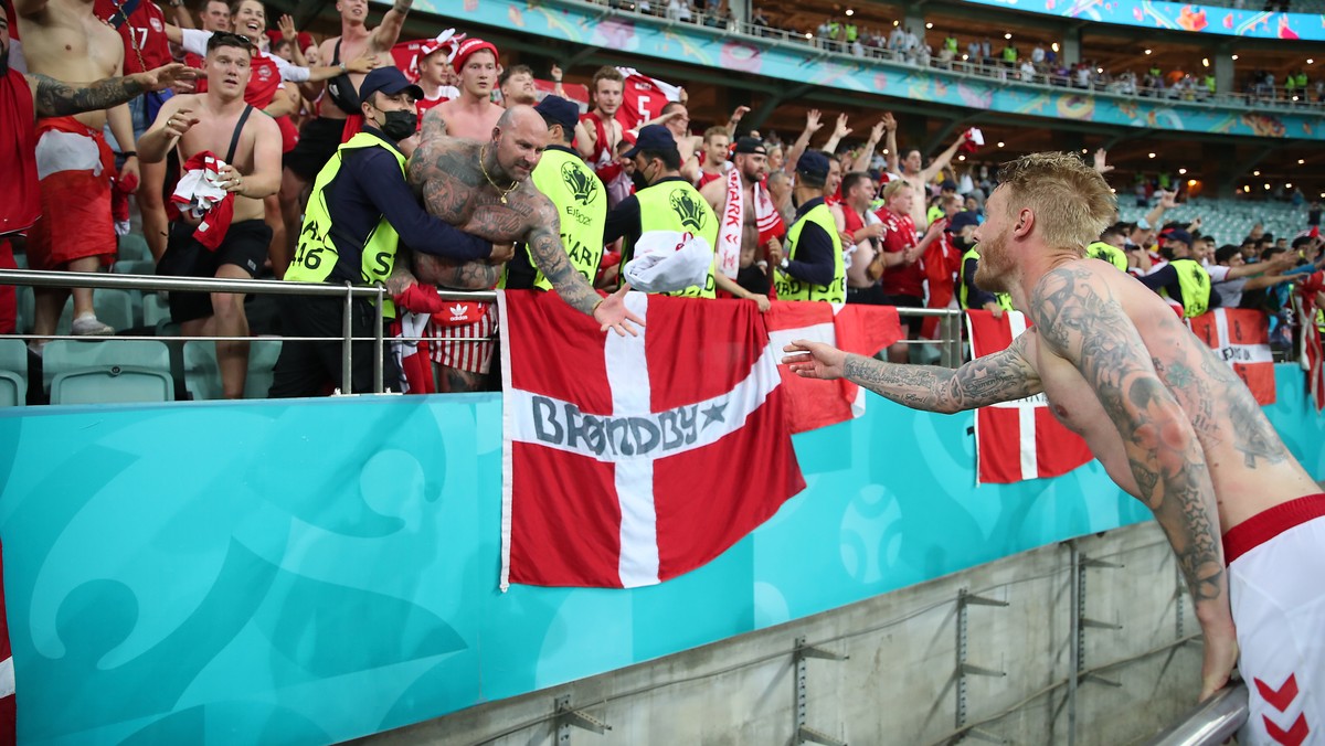 epa09321004 Simon Kjaer of Denmark celebrates with the fans after the UEFA EURO 2020 quarter final match between the Czech Republic and Denmark in Baku, Azerbaijan, 03 July 2021. EPA/Tolga Bozoglu / P ...