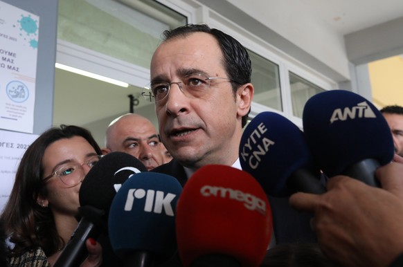 epa10448469 Cypriot independent presidential candidate Nikos Christodoulides talks to the media after voting during presidential elections in Geroskipou village near the Pafos city, Cyprus, 05 Februar ...