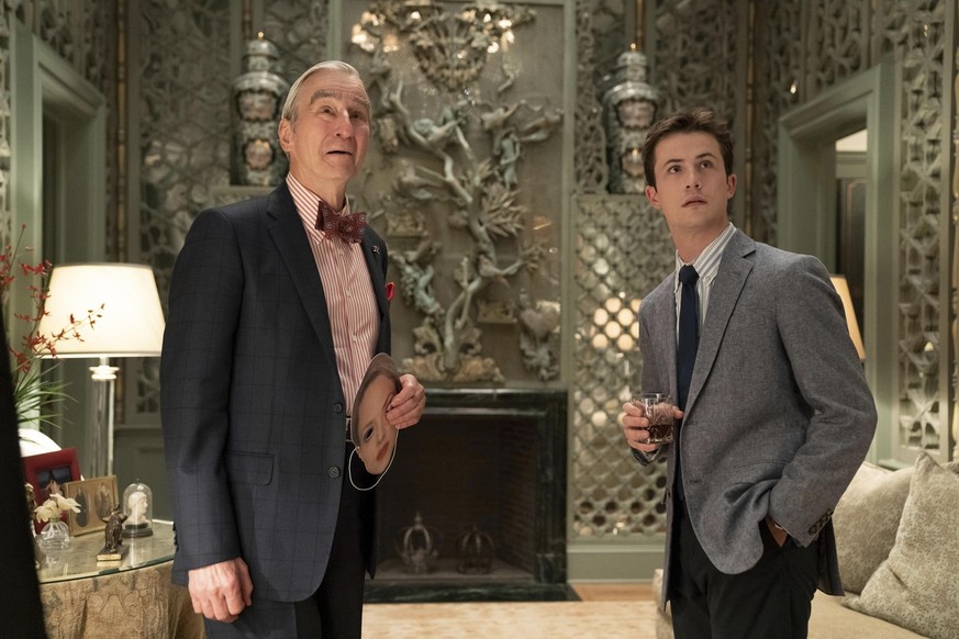 This image released by Hulu shows Sam Waterston as George Schultz, left, and Dylan Minnette as Tyler Shultz in the Hulu series &quot;The Dropout,&quot; premiering March 3. (Michael Desmond/Hulu via AP ...