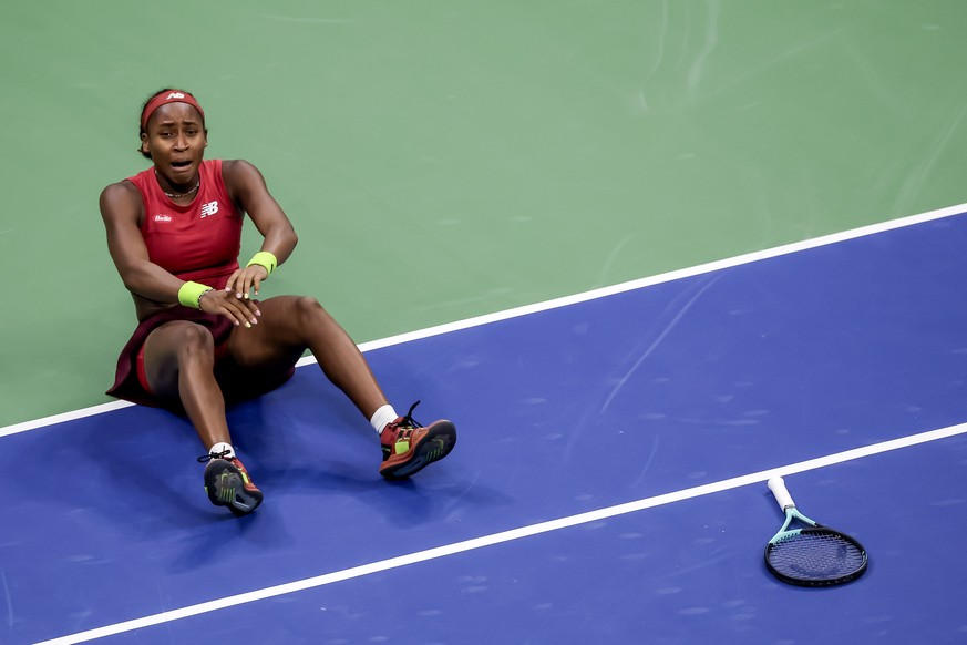 epa10851684 Coco Gauff of the United States reacts after defeating Aryna Sabalenka of Belarus to win the women&#039;s singles final match during the US Open Tennis Championships at the USTA National T ...