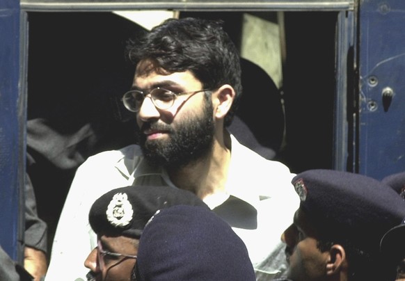 FILE - In this March 29, 2002, file photo, Ahmed Omar Saeed Sheikh, the alleged mastermind behind Wall Street Journal reporter Daniel Pearl&#039;s abduction, arrives at a court in Karachi, Pakistan. A ...