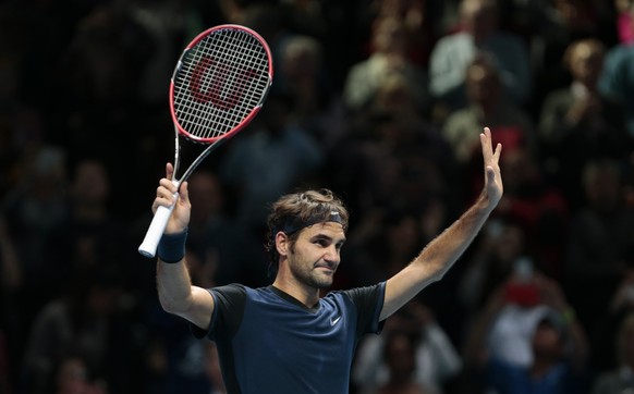 Tennis - Barclays ATP World Tour Finals - O2 Arena, London - 19/11/15
Men&#039;s Singles - Switzerland&#039;s Roger Federer celebrates after winning his match against Japan&#039;s Kei Nishikori
Reut ...