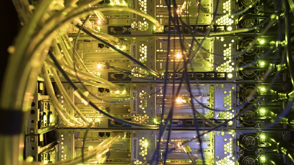 ABOUT SUMMER SESSION TOPICS WE OFFER THE FOLLOWING IMAGES ON TUESDAY, JUNE 12, 2018 ---- Rear view of a network rack with network components: patch panels, LED, fiber optics...