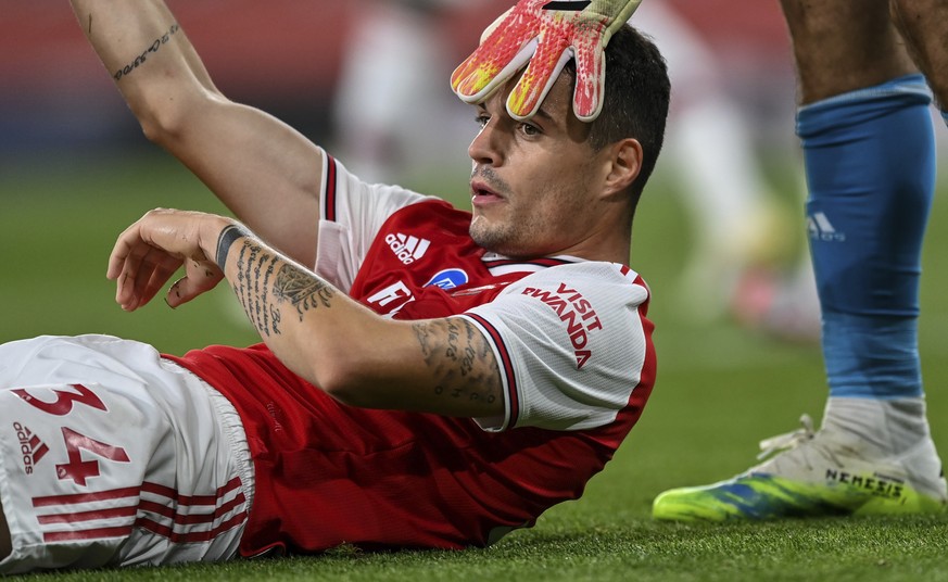 Arsenal&#039;s Granit Xhaka during the English Premier League soccer match between Arsenal and Liverpool at the Emirates Stadium in London, England, Wednesday, July 15, 2020. (Shaun Botterill/Pool via ...