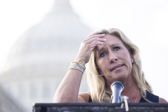 epa09271991 Republican Representative from Georgia Marjorie Taylor Greene holds a press conference to say she visited the Holocaust Museum and wanted to express remorse for comparing mask-wearing to t ...