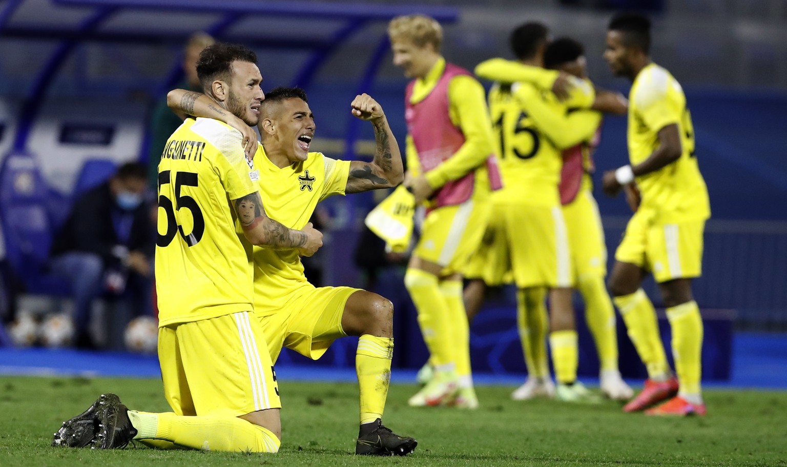 epa09429608 The Sheriff soccer players celebrate qualifying for the next round after the 0-0 in the UEFA Champions League Play-Off second leg soccer match between GNK Dinamo Zagreb and Sheriff at Maks ...