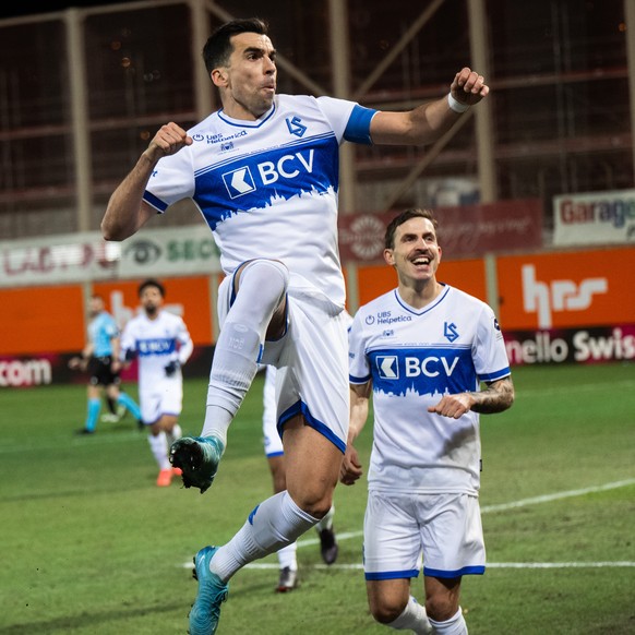 Noe Dussenne (LS) left, celebrate the 1 - 3 goal with Olivier Custodio (LS), during the Super League soccer match FC Lugano against FC Lausanne Sport, at the Cornaredo Stadium in Lugano, Sunday, Decem ...