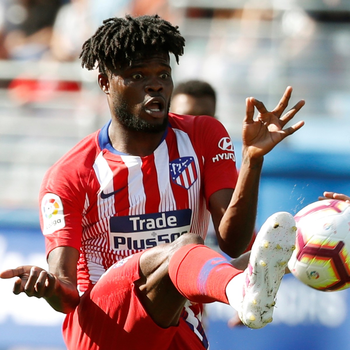 epa07517988 Eibar's defender Marc Cucurella (R) duels for the ball against Atletico de Madrid's midfielder Thomas Partey (L) during the Spanish LaLiga match between SD Eibar and Atletico de  ...