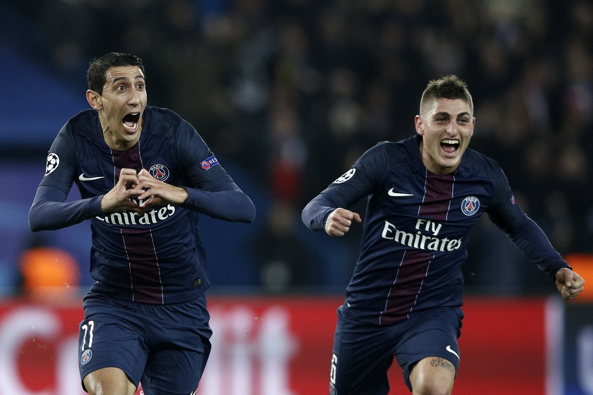 epa05793578 Paris Saint Germain's Angel Di Maria (L) celebrates with team mate Marco Verratti (R) after scoring the 1-0 lead during the UEFA Champions League round of 16 first leg soccer match be ...