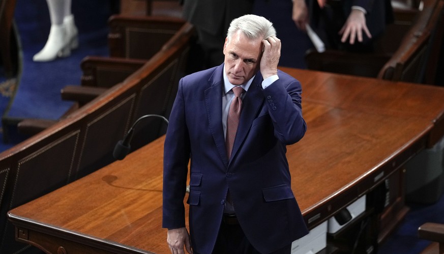 California House Minority Leader Kevin McCarthy arrives on the house floor before Ukrainian President Volodymyr Zelenskyy addresses Congress on his first trip outside his country since the Russian invasion.