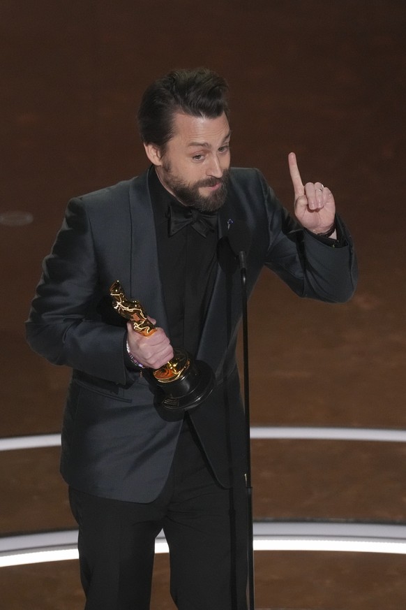 Kieran Culkin accepts the award for best performance by an actor in a supporting role for &quot;A Real Pain&quot; during the Oscars on Sunday, March 2, 2025, at the Dolby Theatre in Los Angeles. (AP P ...