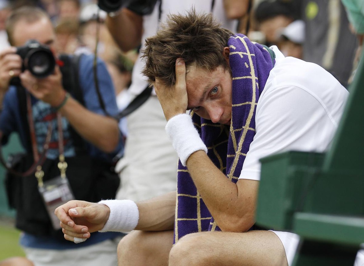 FILE - This June 24, 2010, file photo shows France's Nicolas Mahut sitting in his chair courtside following his loss to John Isner of the U.S. in their record-breaking men's singles match at ...