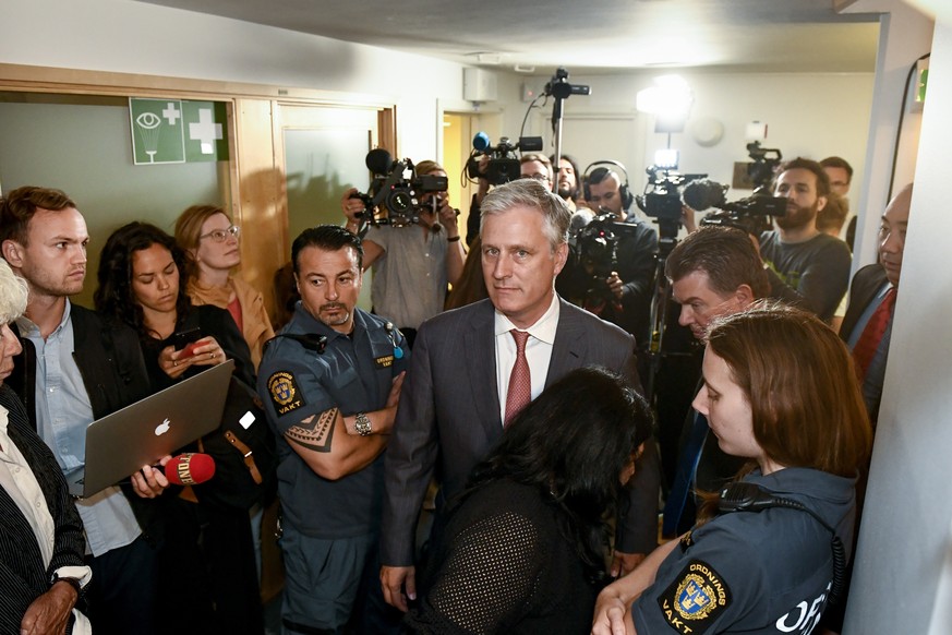 epa07748307 Robert C. O'Brien (C), United States Special Presidential Envoy for Hostage Affairs, outside the courtroom in Stockholm, Sweden, 30 July 2019. US rapper ASAP Rocky was appearing in co ...