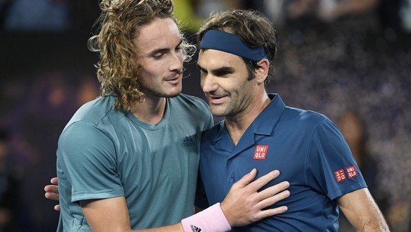 Greece&#039;s Stefanos Tsitsipas, left, is congratulated by Switzerland&#039;s Roger Federer after winning their fourth round match at the Australian Open tennis championships in Melbourne, Australia, ...