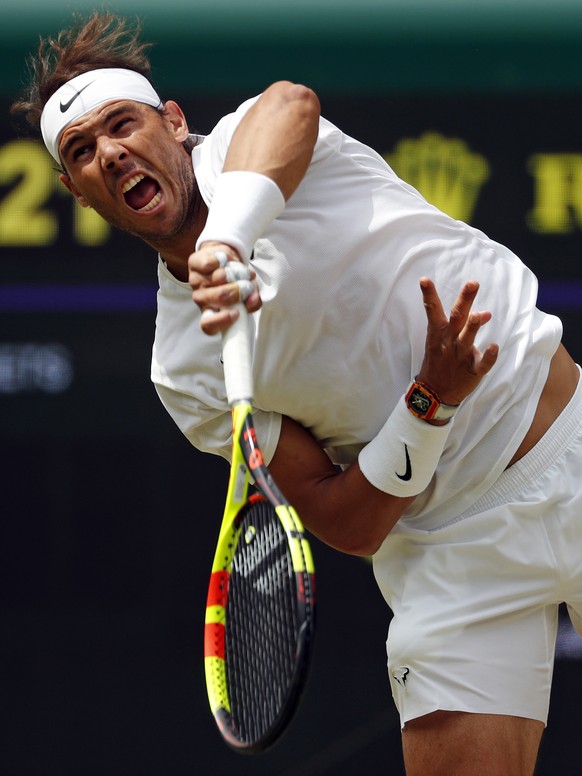 Spain's Rafael Nadal serves to Portugal's Joao Sousa in a Men's singles match during day seven of the Wimbledon Tennis Championships in London, Monday, July 8, 2019. (AP Photo/Alastair ...