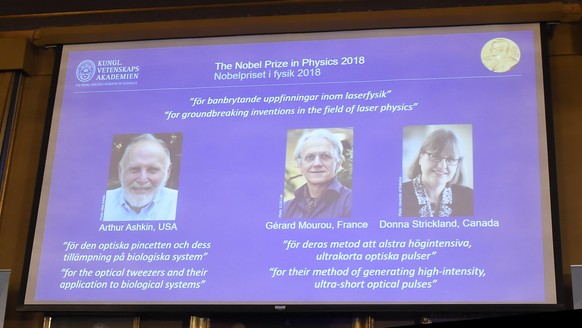 epa07063133 The Nobel Prize laureates for Physics 2018 are announced at the Royal Swedish Academy of Sciences in Stockholm, Sweden, 02 OCtober 2018. The prize is shared between Arthur Ashkin of the US ...
