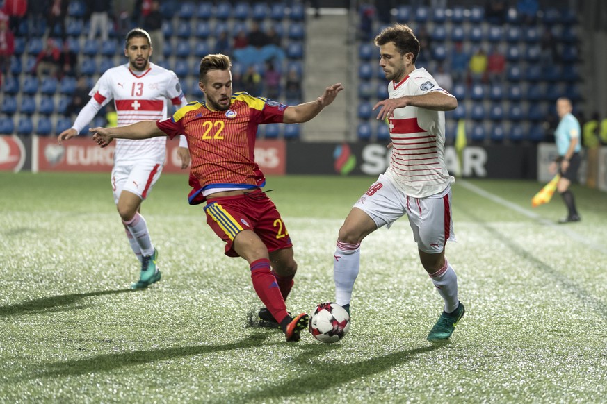 Andorra&#039;s Victor Rodriguez, left, fights for the ball against Switzerland&#039;s Admir Mehmedi, right, during the 2018 Fifa World Cup Russia group B qualification soccer match between Andorra and ...