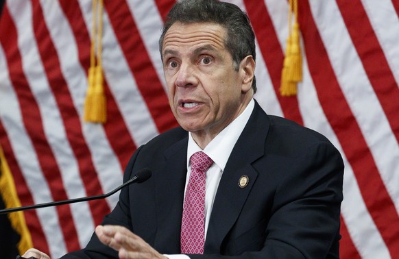 epa08405949 New York Governor Andrew Cuomo speaks to reporters during his daily briefing at the Northwell Health facility in Manhasset, New York, USA, on 06 May 2020. New York, as well as many other s ...