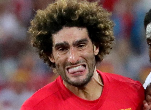 epa06848498 Marouane Fellaini of Belgium (L) and Danny Rose of England in action during the FIFA World Cup 2018 group G preliminary round soccer match between England and Belgium in Kaliningrad, Russi ...