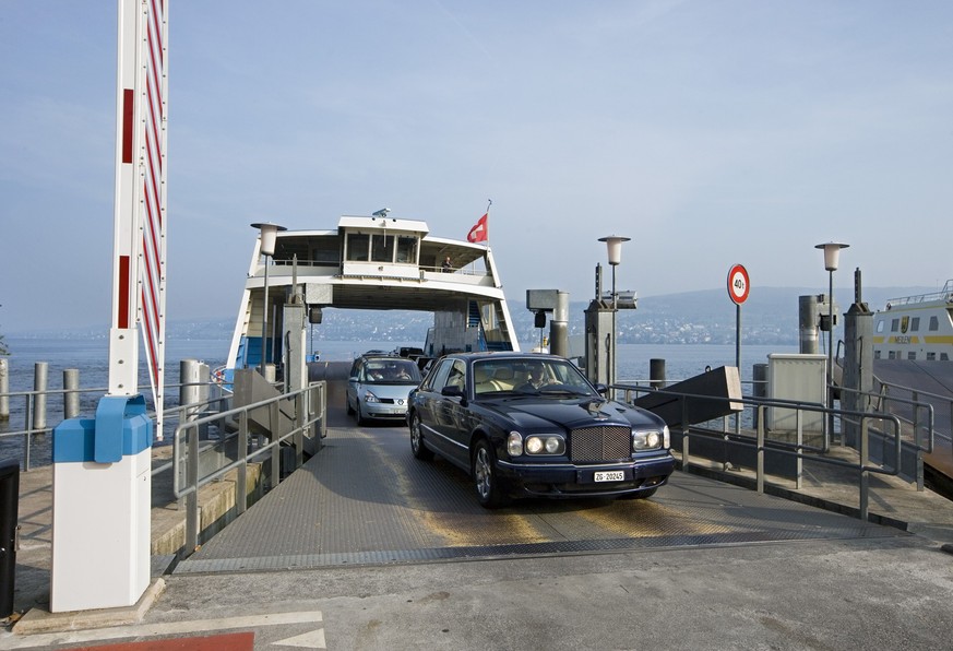 Cars drive off the car deck of the car ferry "Zuerisee" at the landing stage in Meilen in the canton of Zurich, Switzerland, pictured on October 10, 2007. The ferry crosses Lake Zurich and p ...