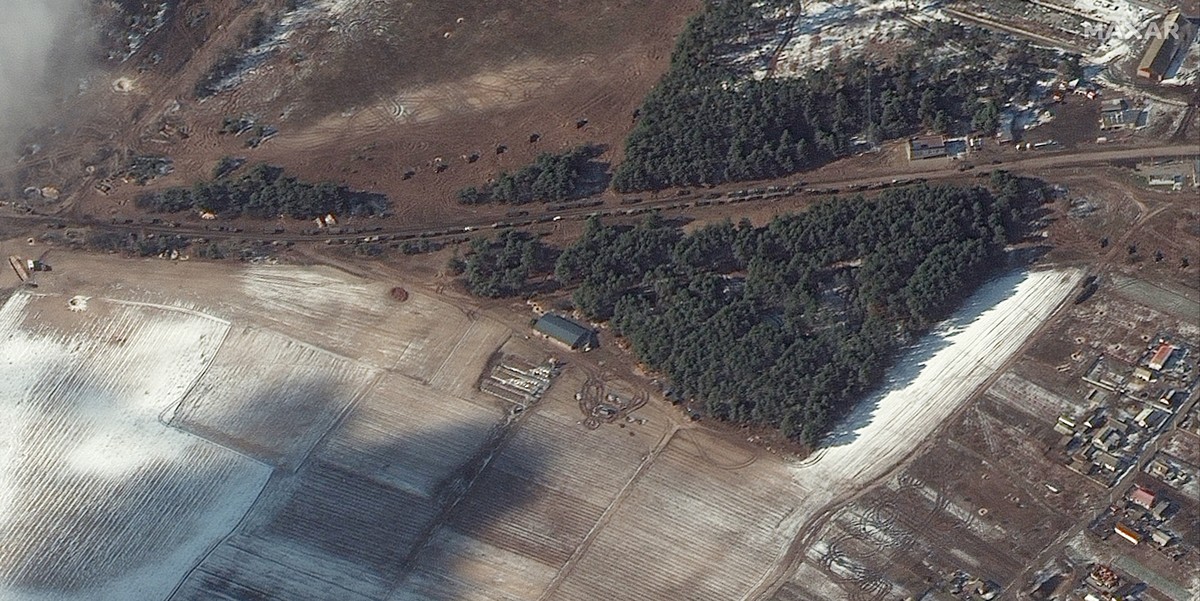 epa09816367 A handout satellite image made available by Maxar Technologies shows resupply trucks and probable multiple rocket launch deployment in Berestyanka, Ukraine, 10 March 2022. EPA/MAXAR TECHNO ...