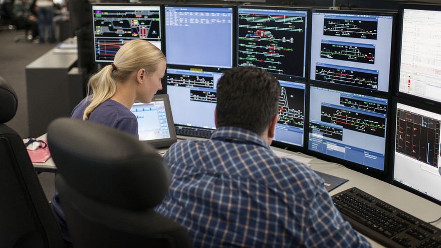 Employees controls train stations and trains at the railway control center east of the SBB Swiss National Railways, January 10, 2014. All the railway traffic in the eastern part of Switzerland is stee ...