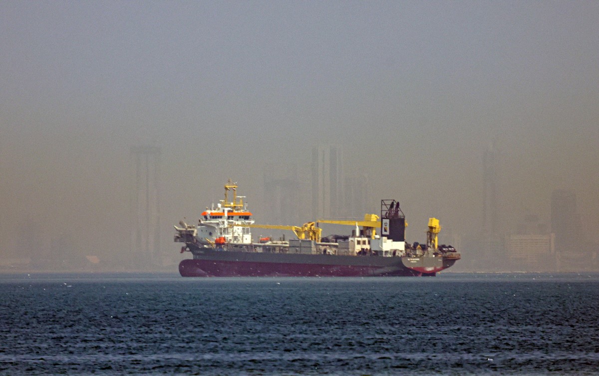 epa12787003 A vessel is seen anchoring off the coast of Dubai, United Arab Emirates, 01 March 2026. Following a joint Israel-US military operation targeting multiple locations across Iran in the early ...