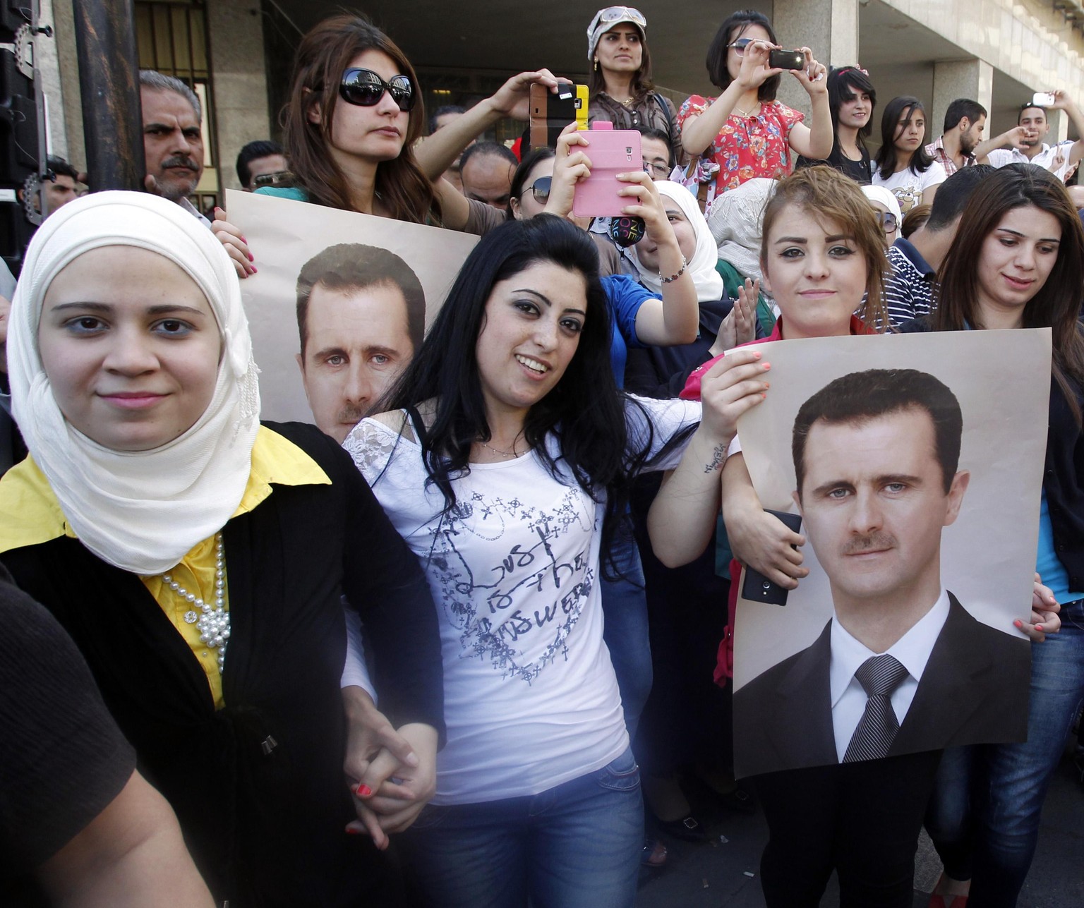 28. April 2014: Anhänger von Präsidenten Bashar al-Assad feiern auf den Strassen Damaskus&nbsp;seine Nomination zur Wiederwahl.
