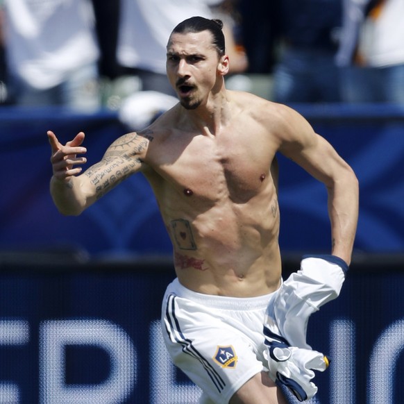 epa06640493 Los Angeles Galaxy Zlatan Ibrahimovic of Sweden reacts after tying the score at 3 apiece in second half action against Los Angeles Football Club at StubHub Center in Carson, California, US ...