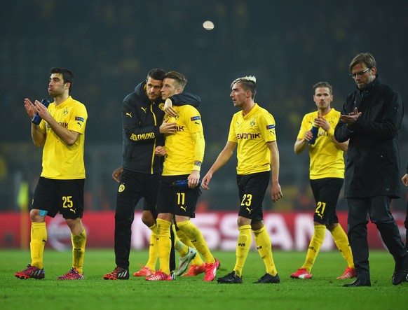 DORTMUND, GERMANY - MARCH 18:  Dejected Sokratis Papastathopoulos, Marco Reus and Oliver Kirch and ManagerJurgen Klopp of Borussia Dortmund after defeat in the UEFA Champions League Round of 16 between Borussia Dortmund and Juventus at Signal Iduna Park on March 18, 2015 in Dortmund, Germany.  (Photo by Lars Baron/Bongarts/Getty Images)