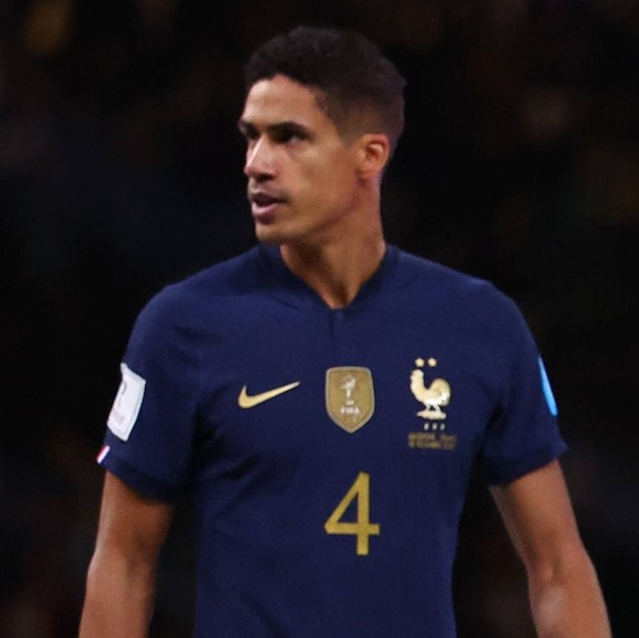 Doha, Qatar, 18th December 2022. Raphael Varane of France and Hugo Lloris of France dejected as they collect their losers medals during the FIFA World Cup, WM, Weltmeisterschaft, Fussball 2022 match a ...