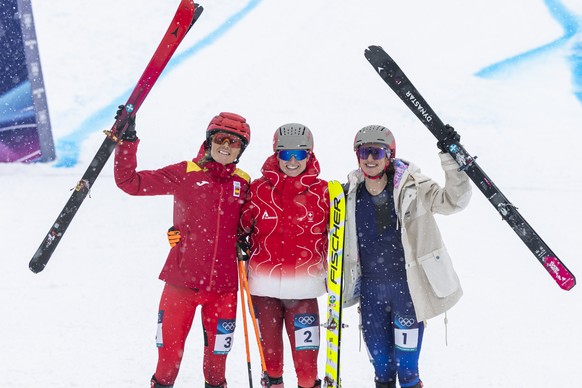 Silver medalist Spain's Ana Alonso Rodriguez, gold medalist Switzerland's Marianne Fatton and bronce medalist France's Emily Harrop, from left, pose after the women's Ski Mountaine ...