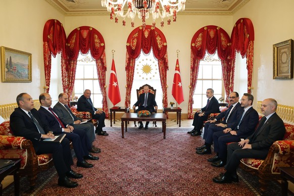 epa11290354 A handout photo made available by the Turkish President Press Office shows Turkish President Recep Tayyip Erdogan (C), Egyptian Foreign Minister Sameh Shoukry (C-L) and Turkish Foreign Min ...